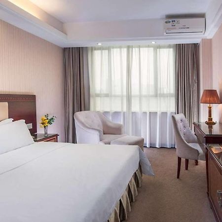 Vienna Hotel Longgang Nanlian Шеньчжень Екстер'єр фото